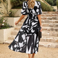 Alma | Bloemenjurk – Romantische Elegantie En Gestructureerde Mouwen 